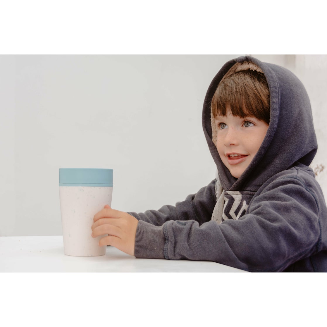 Reusable coffee cup lifestyle with child